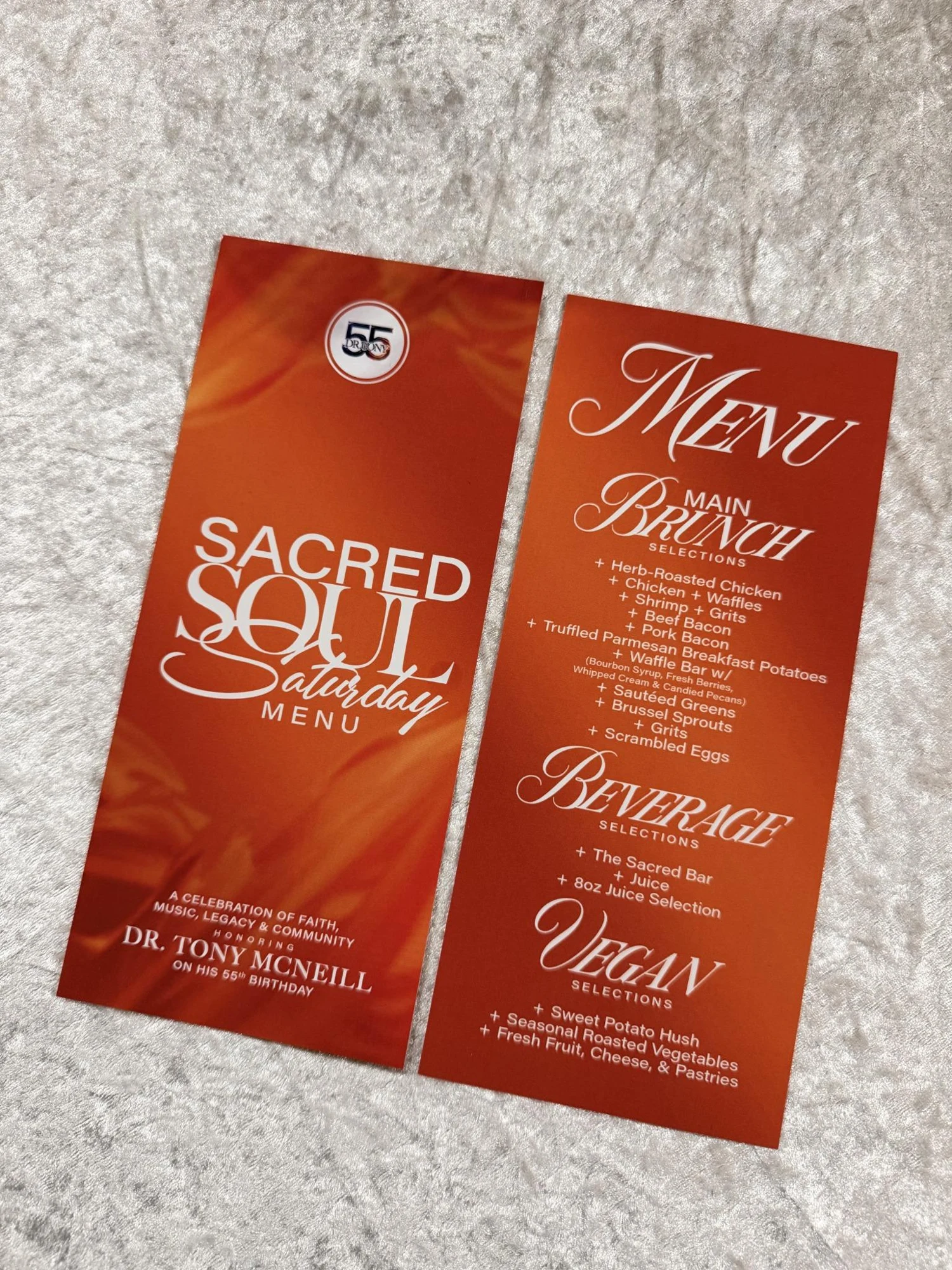 Printed orange menu and event materials for Sacred Soul Saturday